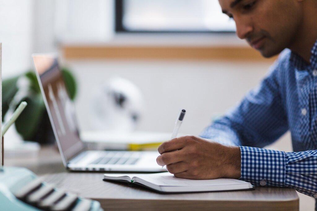 Investigator analysing verified records on a secure system to legally and efficiently find someone’s address in the UK.