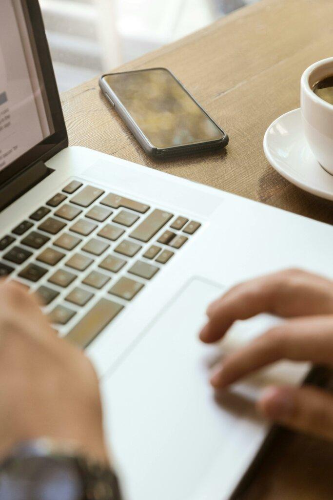 Senior detective reviewing files and monitoring surveillance feeds as a private detective in London gathers evidence discreetly.
