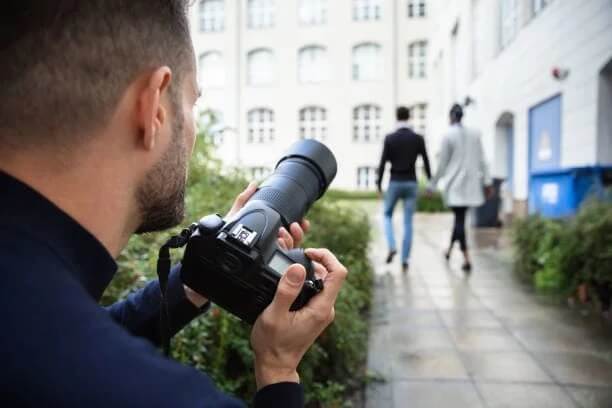 Matrimonial Private Investigator capturing discreet surveillance evidence for infidelity cases, protecting clients with full confidentiality.